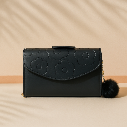 Eval BloomCharm – Black Floral Embossed Wallet with Pom-Pom Chain
